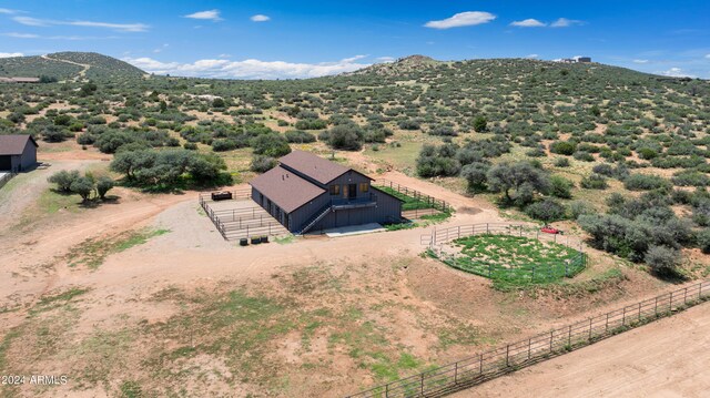 aerial view featuring a rural view and a mountain view