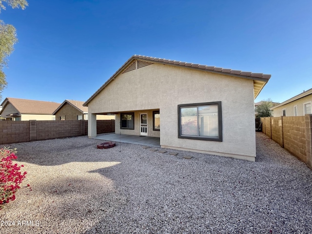 back of house featuring a patio