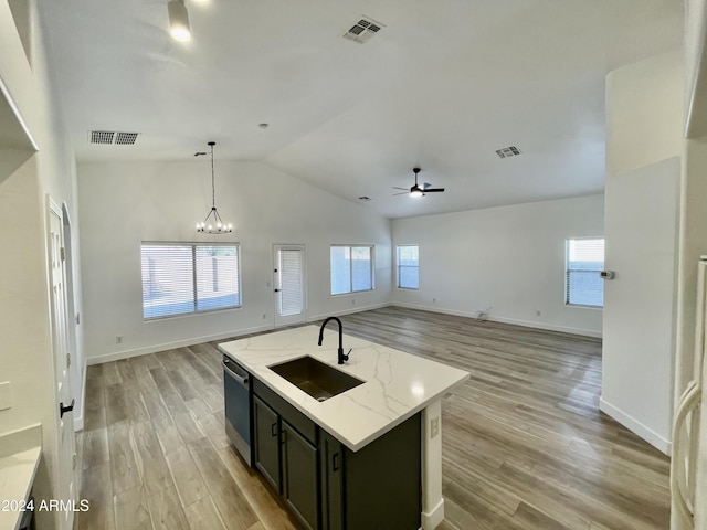 kitchen featuring dishwasher, plenty of natural light, and sink