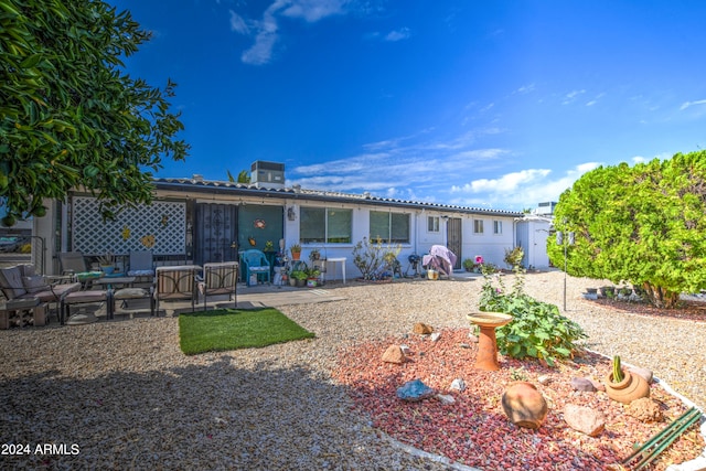 rear view of house featuring a patio area