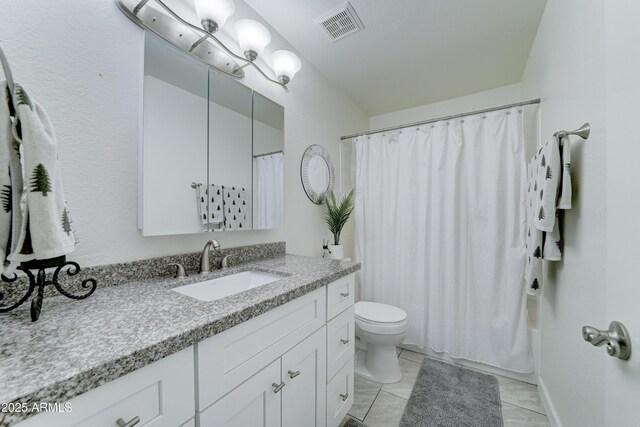 full bathroom with tile patterned flooring, visible vents, toilet, shower / bath combo, and vanity