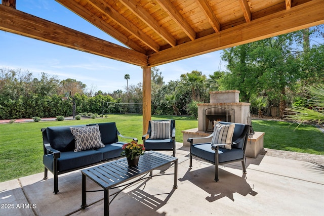 view of patio / terrace with an outdoor living space with a fireplace