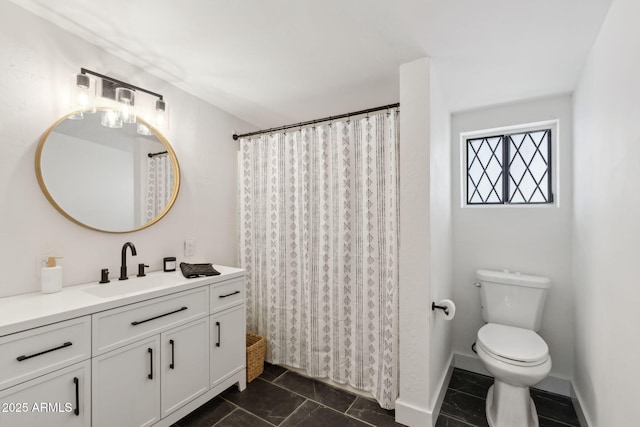 full bath featuring vanity, a shower with shower curtain, tile patterned flooring, and toilet