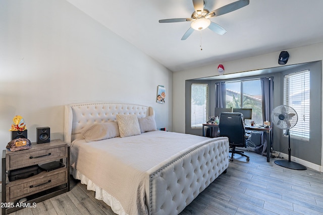 8510 W Joan De Arc Ave, Peoria, AZ 85381 - bedroom with vaulted ceiling, ceiling fan, and wood finished floors