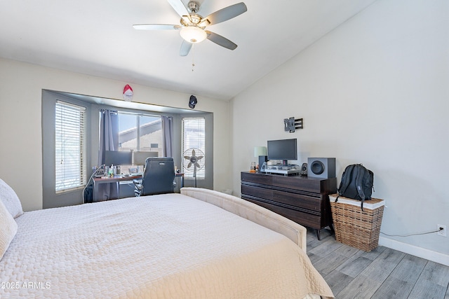 8510 W Joan De Arc Ave, Peoria, AZ 85381 - bedroom featuring lofted ceiling, light wood-style flooring, baseboards, and a ceiling fan
