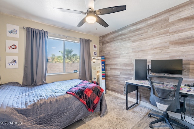 8510 W Joan De Arc Ave, Peoria, AZ 85381 - bedroom with wooden walls, wood finished floors, and ceiling fan