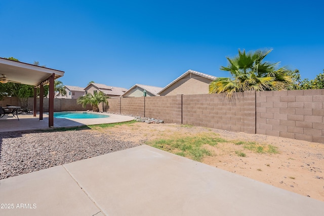 8510 W Joan De Arc Ave, Peoria, AZ 85381 - view of yard with a ceiling fan, a fenced in pool, a fenced backyard, and a patio