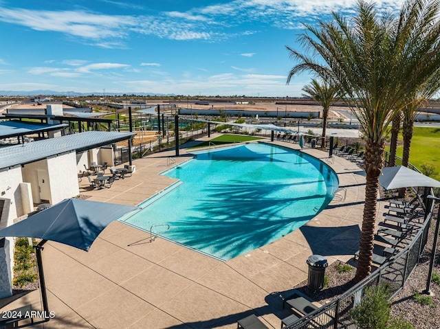 view of pool featuring a patio