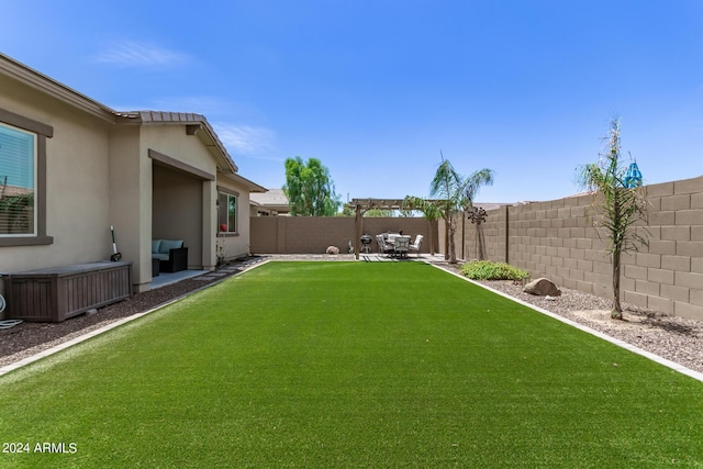 view of yard featuring a pergola and a patio area