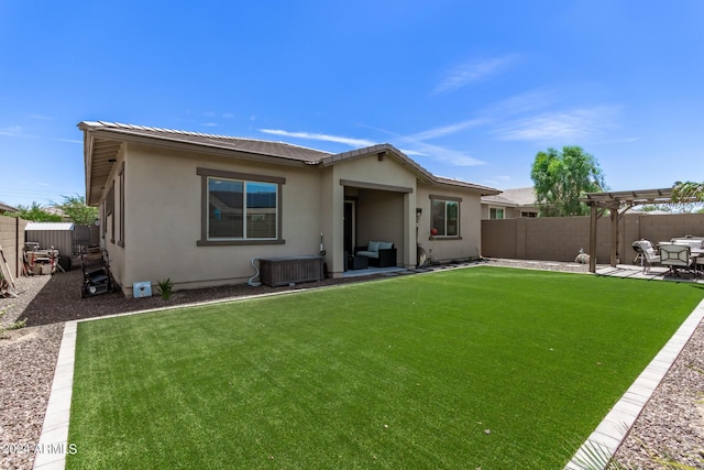 back of property with a lawn, a pergola, a patio area, and cooling unit