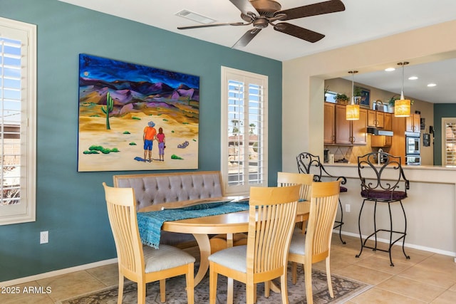 dining room featuring visible vents, ceiling fan, baseboards, light tile patterned floors, and recessed lighting