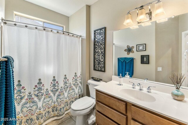 full bath featuring vanity, tile patterned floors, toilet, and a shower with curtain