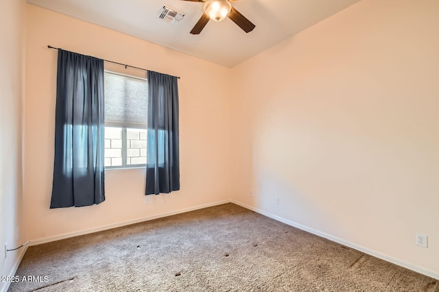 unfurnished room with visible vents, baseboards, ceiling fan, and carpet flooring