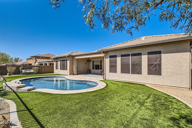 view of pool with a fenced backyard, a patio area, a yard, and a fenced in pool