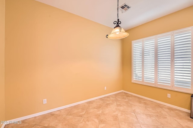 unfurnished room with light tile patterned floors, baseboards, and visible vents