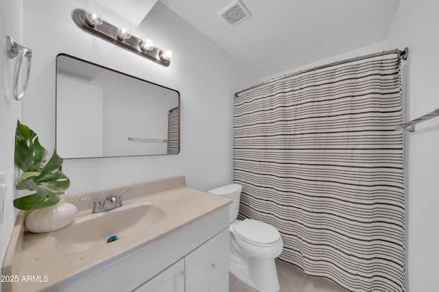 2812 E Clarendon Ave, Phoenix, AZ 85016 - full bathroom with toilet, vanity, and curtained shower
