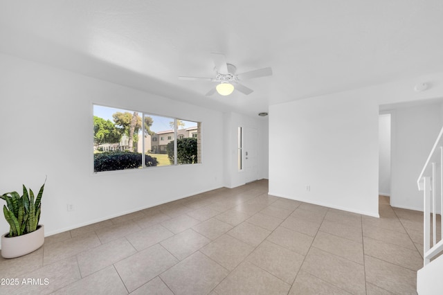 2812 E Clarendon Ave, Phoenix, AZ 85016 - empty room featuring ceiling fan, tile patterned flooring, and baseboards