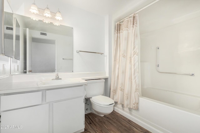 full bath featuring shower / bath combo, visible vents, toilet, wood finished floors, and vanity