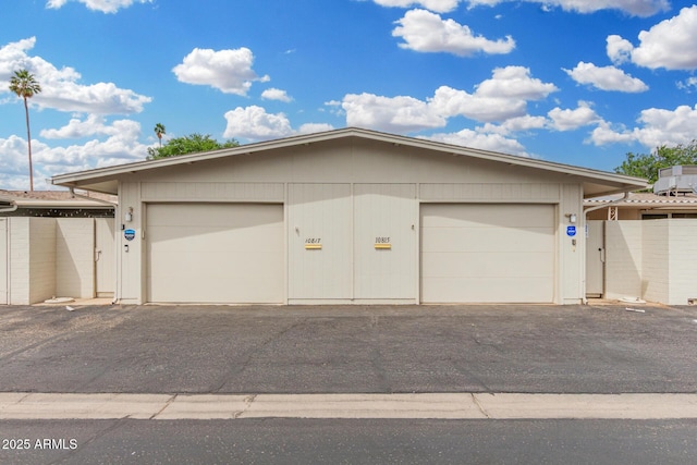 garage with fence