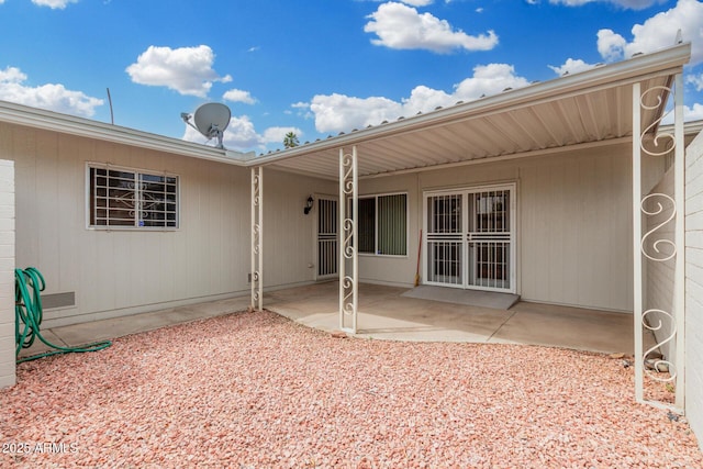 back of house featuring a patio