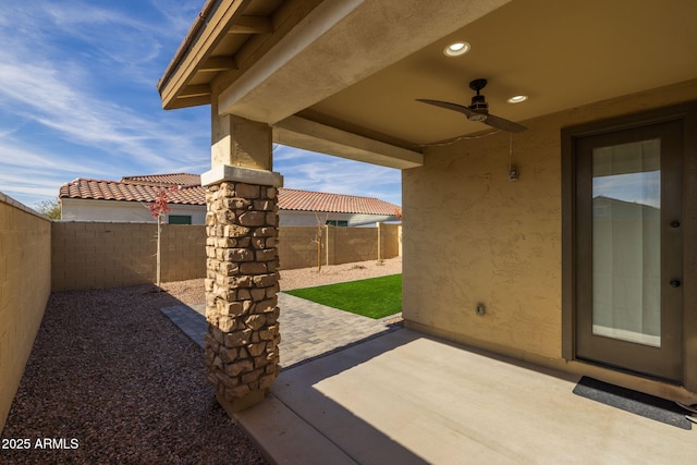 view of patio with ceiling fan