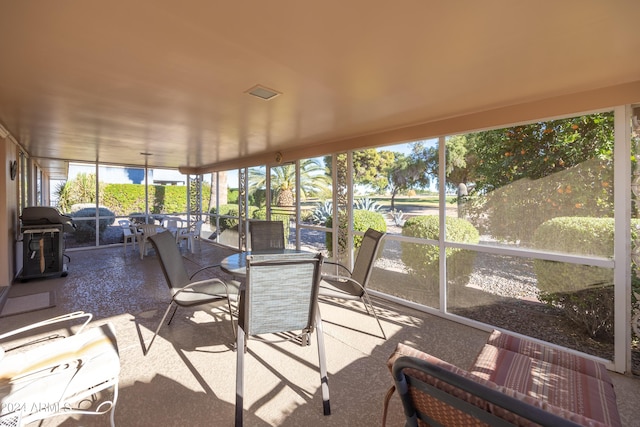 sunroom / solarium featuring a wealth of natural light