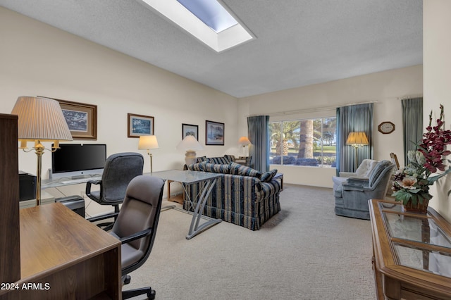 carpeted office featuring a textured ceiling