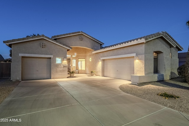 330 W Locust Dr, Chandler, AZ 85248 - view of front of property featuring concrete driveway, a tiled roof, a garage, and stucco siding