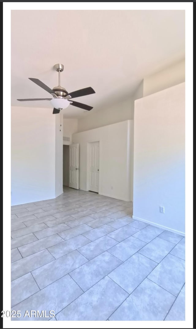 22951 W Loma Linda Blvd, Buckeye, AZ 85326 - empty room featuring a ceiling fan