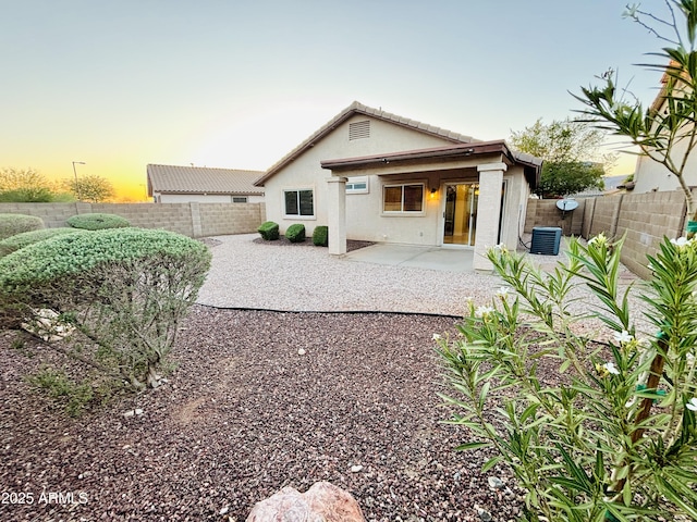 22951 W Loma Linda Blvd, Buckeye, AZ 85326 - back of property with a patio, a fenced backyard, and stucco siding
