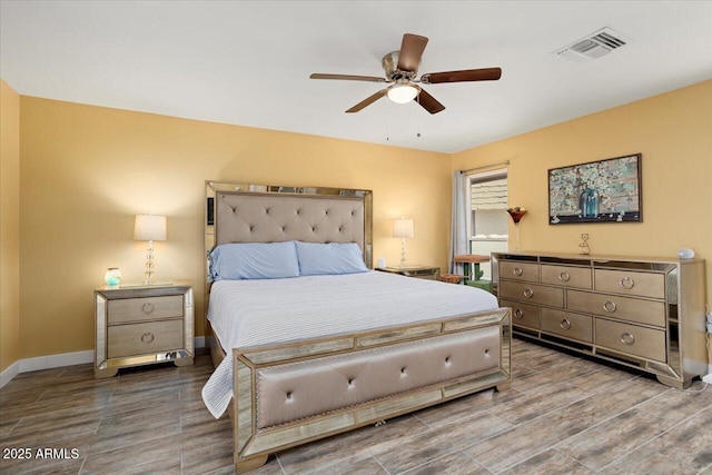 bedroom featuring wood-type flooring and ceiling fan