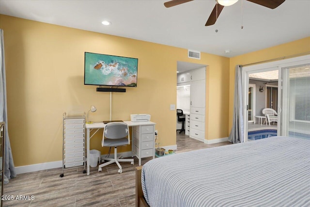 bedroom with wood-type flooring, access to outside, and ceiling fan