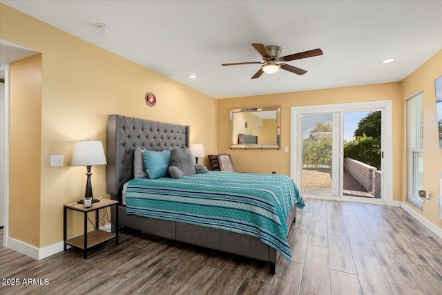 bedroom featuring access to exterior, wood-type flooring, and ceiling fan