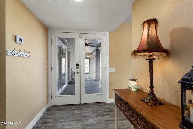 doorway to outside with dark hardwood / wood-style flooring