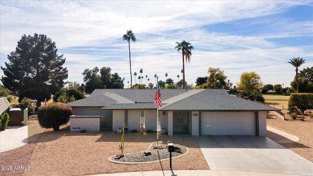 single story home with a garage