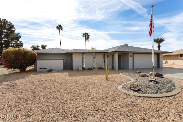 single story home with a garage