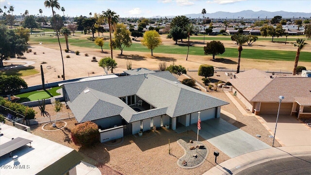 drone / aerial view featuring a mountain view