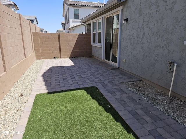 14224 W Hackamore Dr, Surprise, AZ 85387 - fenced backyard with a patio area