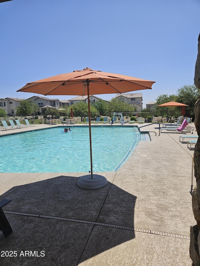 14224 W Hackamore Dr, Surprise, AZ 85387 - community pool with a patio