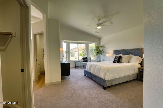 3940 E Heather Ct, Gilbert, AZ 85234 - bedroom featuring carpet floors, arched walkways, vaulted ceiling, and ceiling fan