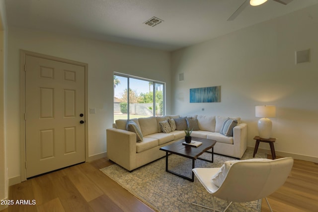 3940 E Heather Ct, Gilbert, AZ 85234 - living room with wood finished floors and a ceiling fan