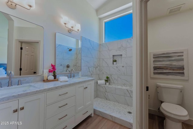 3940 E Heather Ct, Gilbert, AZ 85234 - full bathroom with double vanity, walk in shower, and wood finished floors