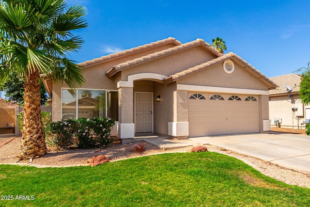 3940 E Heather Ct, Gilbert, AZ 85234 - view of front of house featuring stucco siding, a garage, concrete driveway, a front yard, and a tiled roof