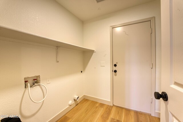 3940 E Heather Ct, Gilbert, AZ 85234 - washroom with hookup for a washing machine, light wood-style flooring, and hookup for an electric dryer