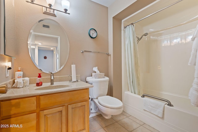 full bathroom with vanity, toilet, tile patterned flooring, and shower / bath combo