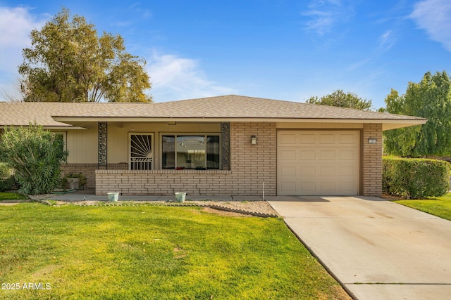 ranch-style home with a garage and a front lawn