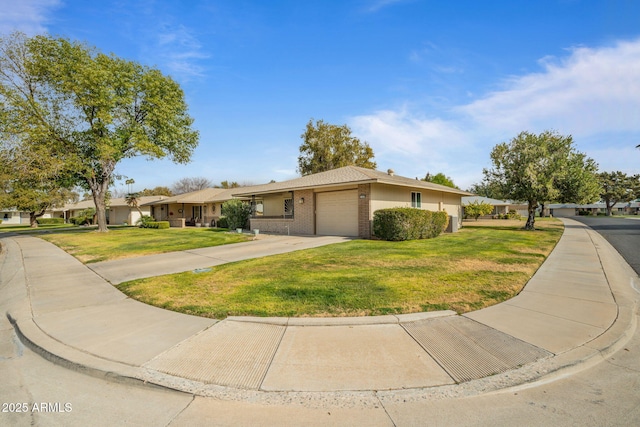 ranch-style home featuring a garage and a front yard