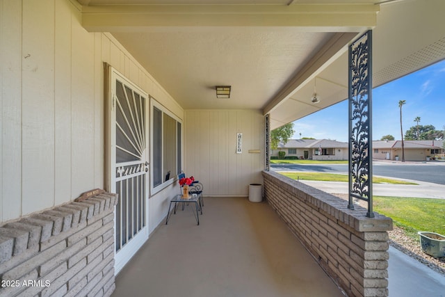 view of patio featuring a porch