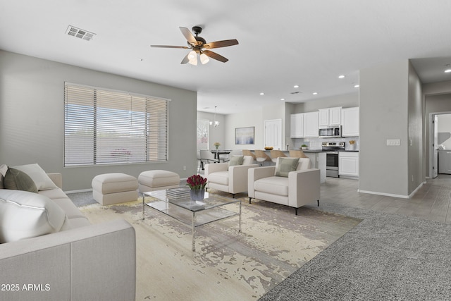 29302 N 126th Ln, Peoria, AZ 85383 - living area with baseboards, a ceiling fan, recessed lighting, and light wood finished floors
