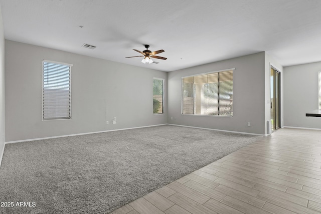 29302 N 126th Ln, Peoria, AZ 85383 - unfurnished room featuring a ceiling fan, wood finished floors, and baseboards